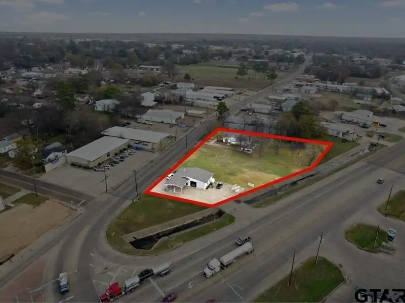Prime Commercial Property with Building and Home on Half Acre Lot