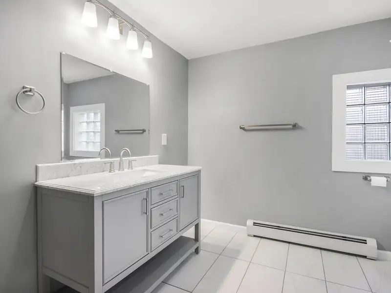 Mixed-use Two Unit Building with Remodeled Three Bedroom Apartment in Prime Location
