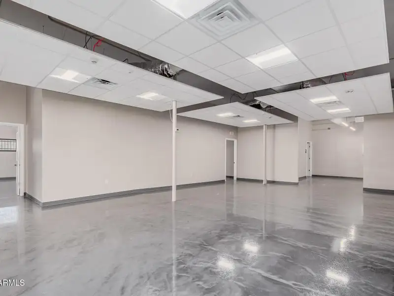 Versatile Commercial Property with Two Buildings and Ample Parking in Prime Location