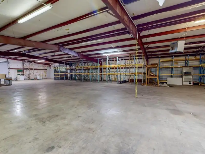 Commercial Property on Busy Highway - 2.1 Acres, 31,000 Sq Ft with Offices and Roll-up Doors