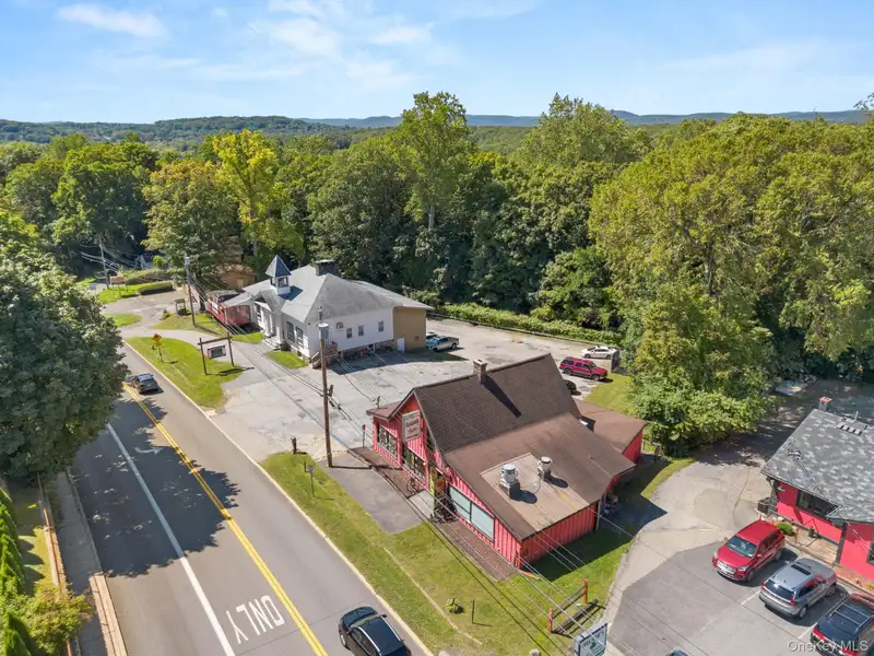 Prime Commercial Property with Restaurant and Retail Space on High-traffic Road