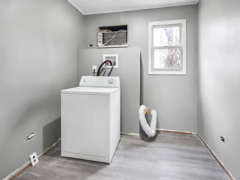 Mixed-use Two Unit Building with Remodeled Three Bedroom Apartment in Prime Location