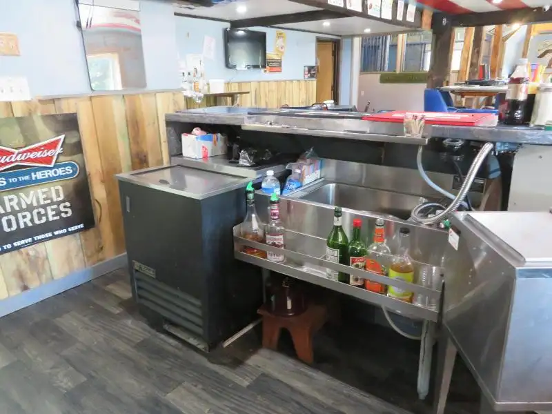 Turnkey Bar/restaurant with 2-bedroom Apartment and Development Potential in Northwoods