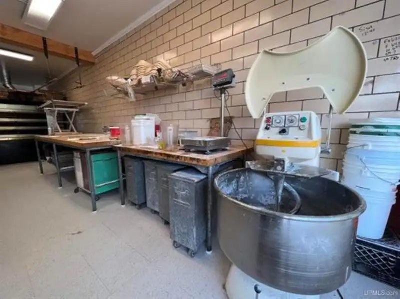 Established Artisan Bakery for Sale in Prime Downtown Location with Production Facilities