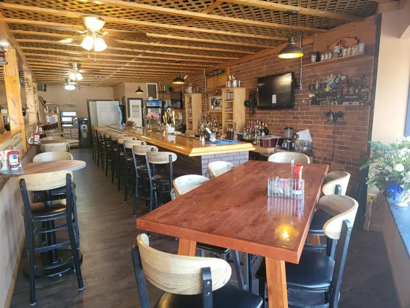 Investment Opportunity: Restaurant with Apartment and Additional Parking Near I-74