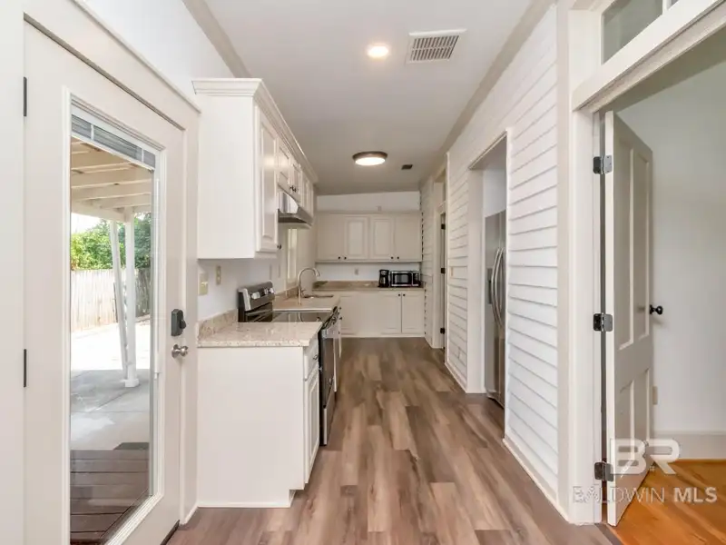 Mixed-use Property in Downtown Mobile, Alabama with High Ceilings and Hardwood Floors