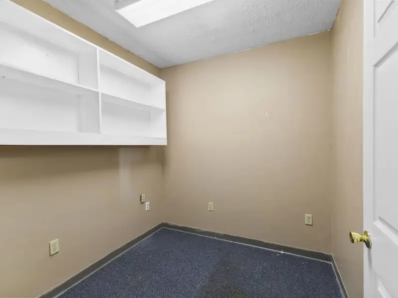 Versatile 4,305 Sq Ft Office Building with Apartment on Highway 11e