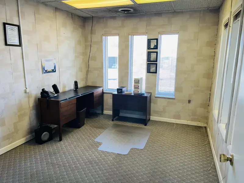 Historic Downtown Brick Building with Vault, Ideal for Office or Retail Conversion