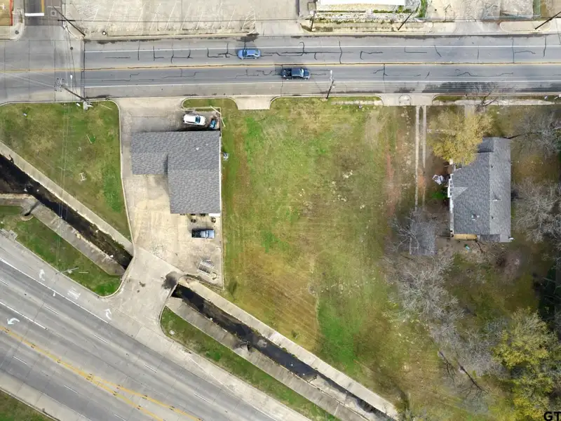 Prime Commercial Property with Building and Home on Half Acre Lot
