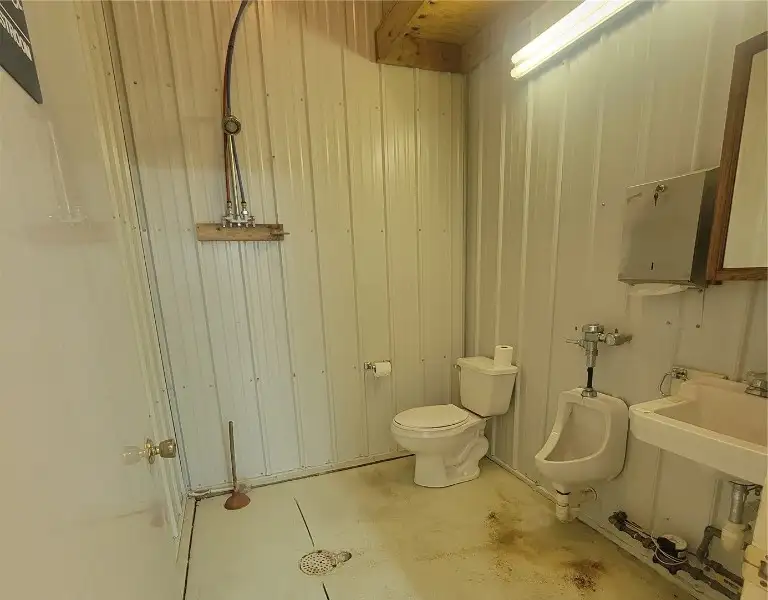 Clean 960 Sq Ft Warehouse for Rent with Bathroom and Utilities, Easy I-380 Access