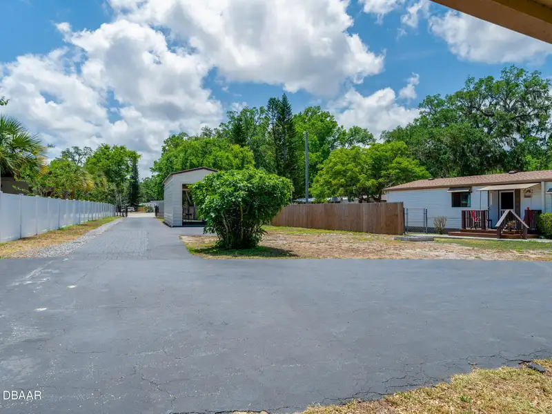 Mixed Use Property: Light Industrial Lot with Adjoining Residential Home and Expansion Potential