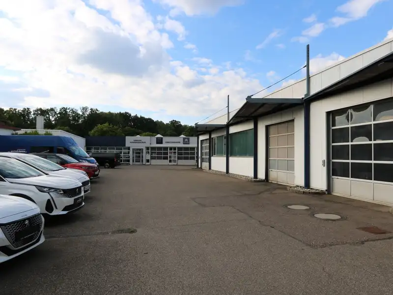 Modern Car Dealership and Service Facility with Residential Space in Schwäbisch Hall