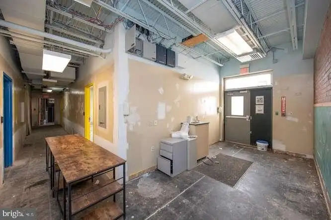 Versatile 6,000 Sq Ft Commercial Space in Prime Location with Parking Potential