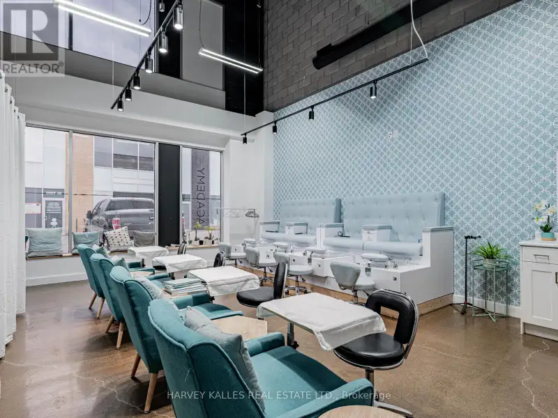 Fully Leased Commercial Condo in Prime Location on the Queensway