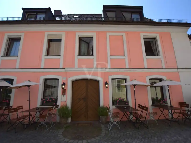 Historic Family-run Hotel in Ansbach with Restaurant, Guest Rooms, and Green Energy Features