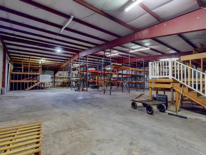 Commercial Property on Busy Highway - 2.1 Acres, 31,000 Sq Ft with Offices and Roll-up Doors