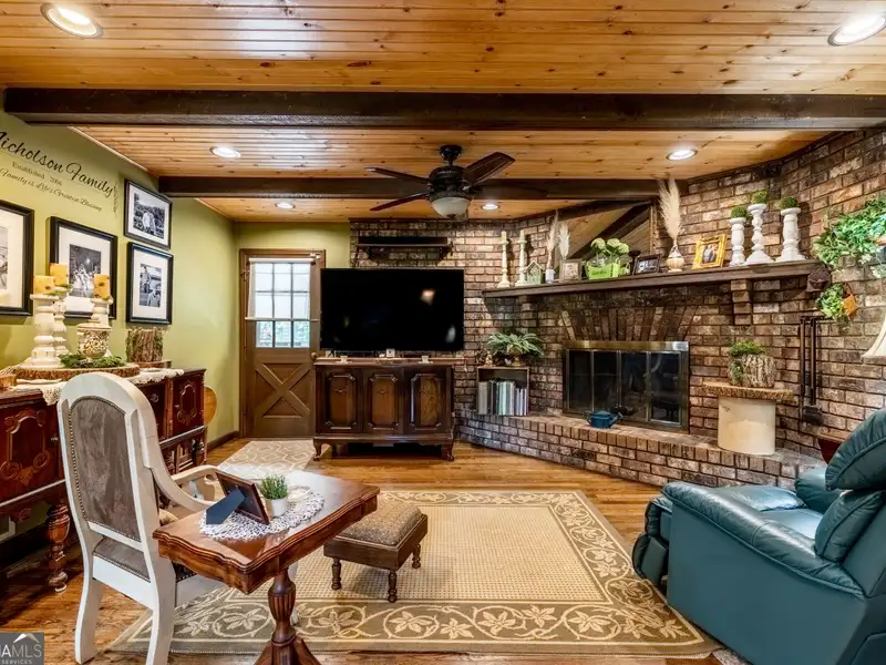 27 Acres with 2,400 Sq. Ft. Home, Duplexes, Pool, and Barn in Prime Location