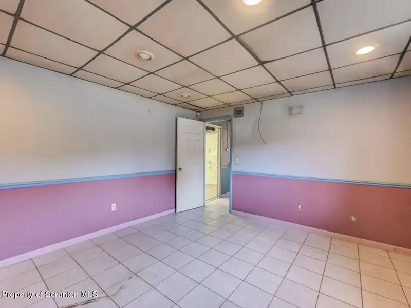 Mixed-use Property in Throop: 7-bay Garage and Updated 2-bedroom Apartment