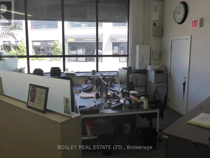 Leaside Retail Space with High Ceilings, Kitchen, and Ample Parking Near Lrt