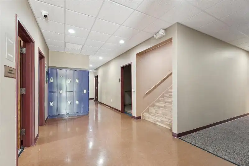 Versatile Commercial Condo for Sale Near Hwy 151 & 41 with Multiple Offices and Amenities