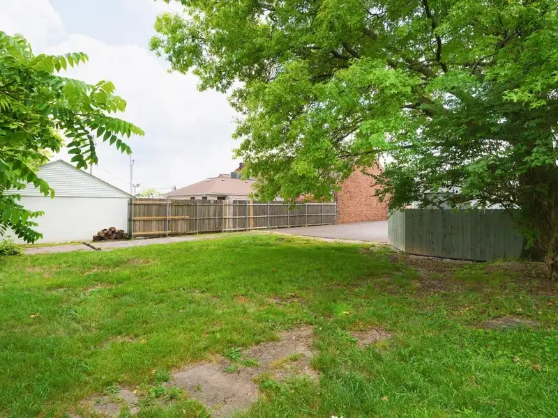 Prime Commercial Building in Downtown Reynoldsburg with Parking and Industrial Garage