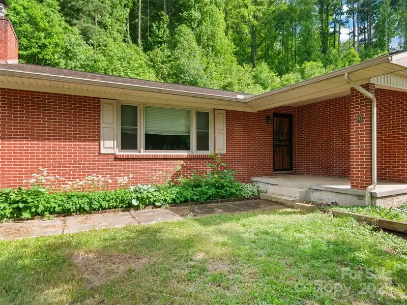 Prime 1.8 Acre Commercial Property with Home in Waynesville, Nc on Major Corridor