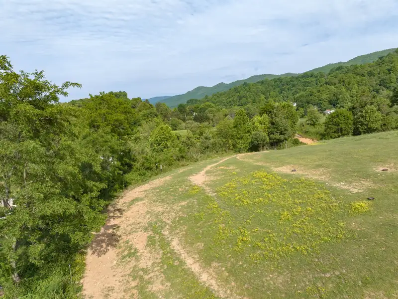 Historic 1918 Stone Building with 3.99 Acres and Detached Workshop in Balsam Road Area