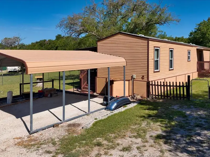 10-acre Mobile Home Community with 5 Units, Fenced, Workshop, and Growth Potential