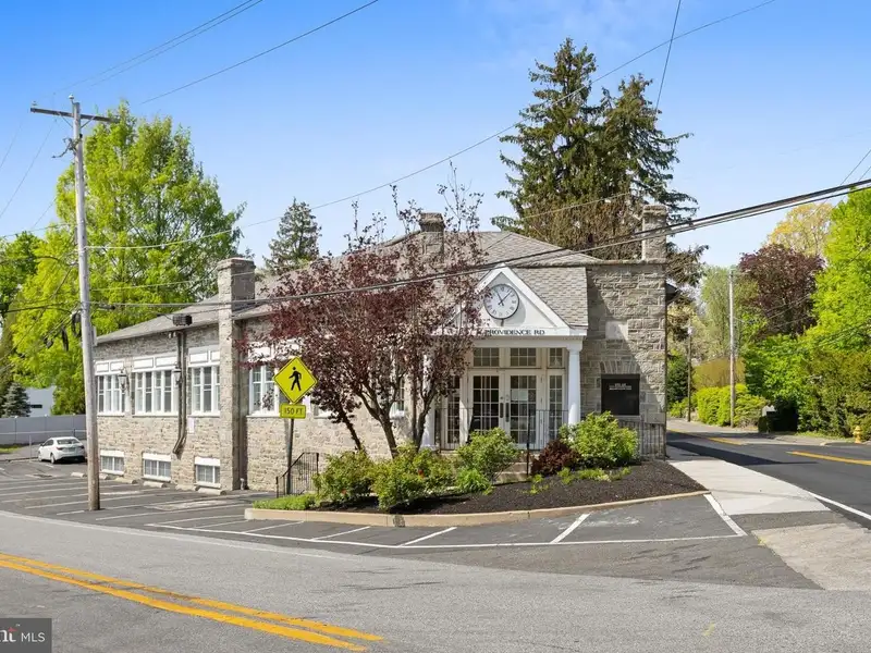 Historic 1921 Office Building in Wallingford with Ample Parking and Strong Investment Potential