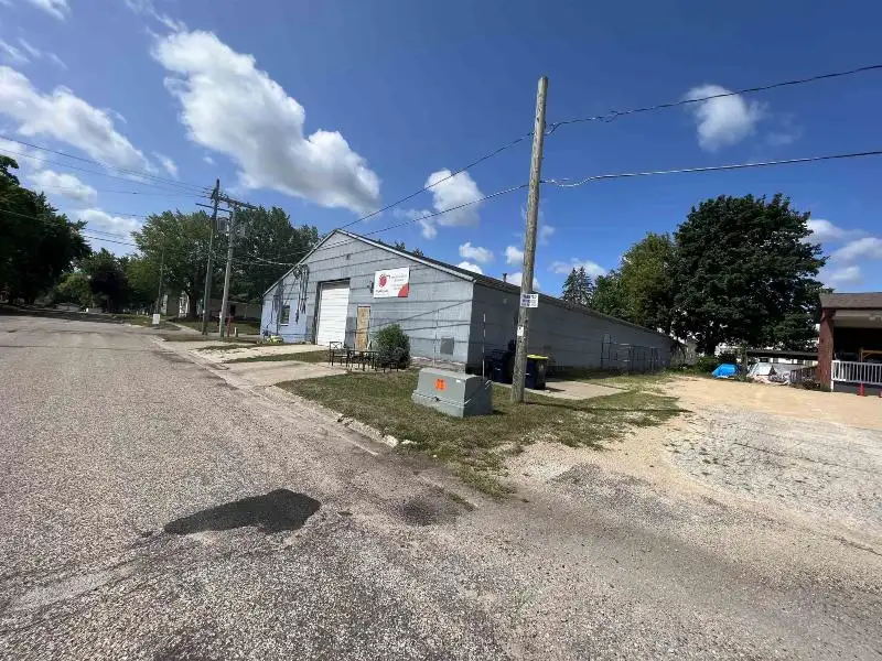 Versatile Mixed-use Property with Office Space and Storage in Residential Area