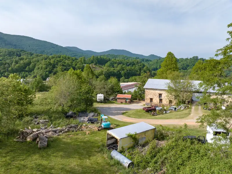 Historic 1918 Stone Building with 3.99 Acres and Detached Workshop in Balsam Road Area