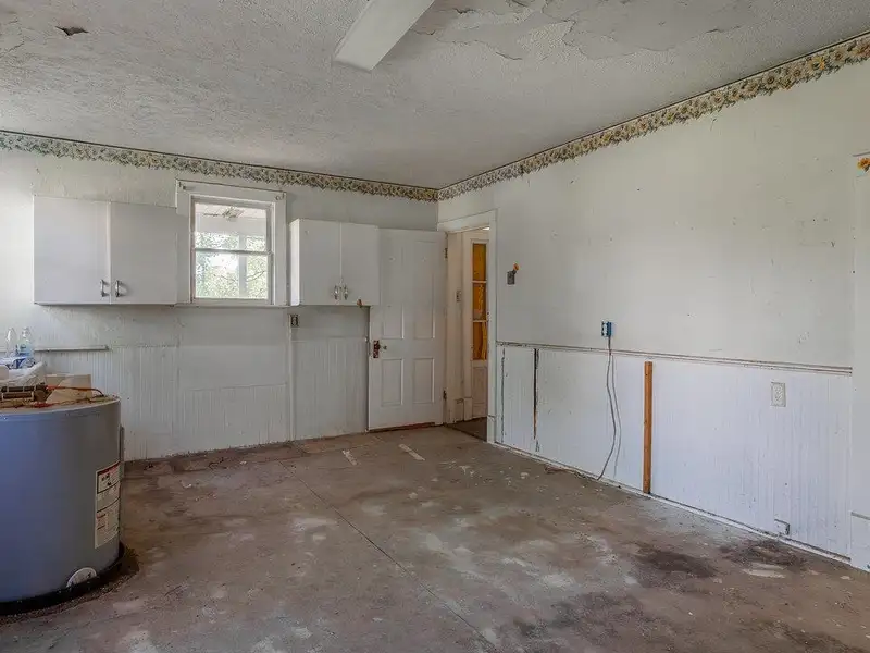 Classic American Foursquare Home in Need of Restoration with Detached Garage