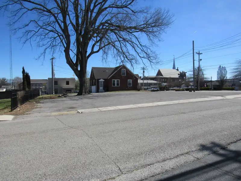 Commercial Investment Opportunity in Historic Mcminnville: Dual Buildings with High Visibility and Parking