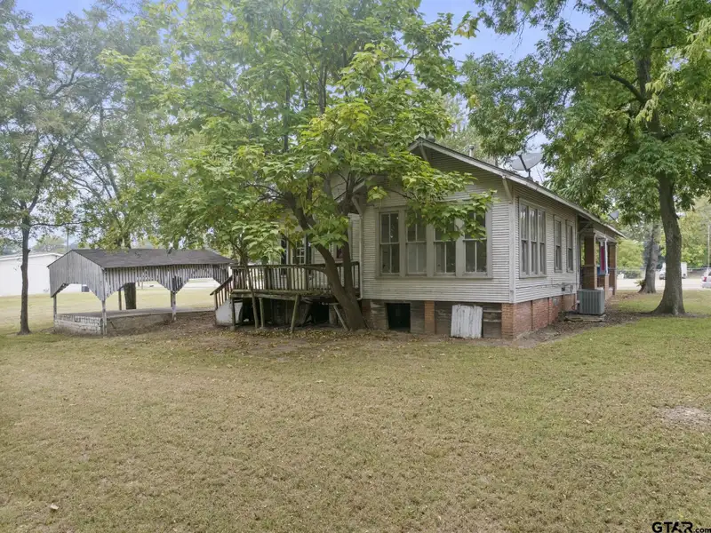 Prime Commercial Property with Building and Home on Half Acre Lot