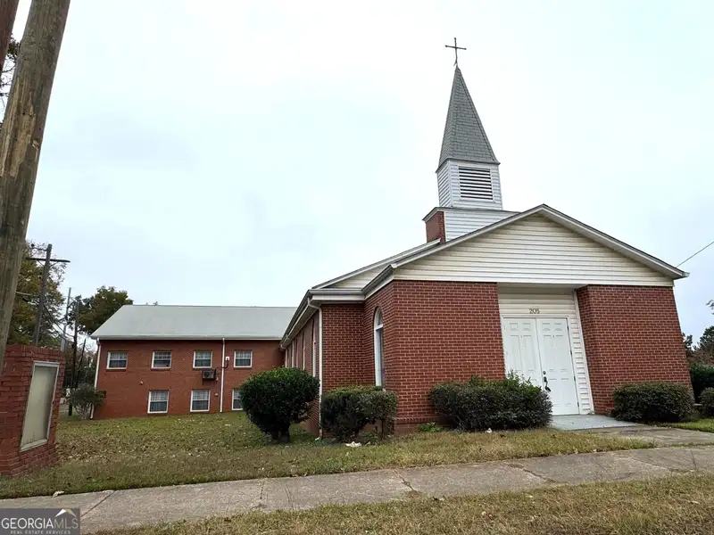 Multi-use Church Property with Sanctuary, Classrooms, Fellowship Hall, and Ample Parking