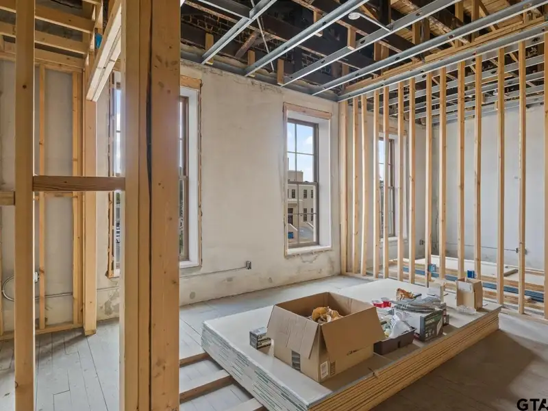 Unfinished Downtown Commercial Building with High Traffic Visibility and Mixed-use Potential