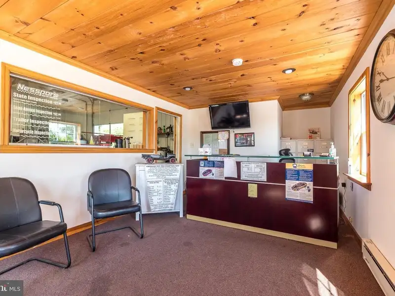 Auto Repair Shop with Residential Income Opportunity in Prime Location
