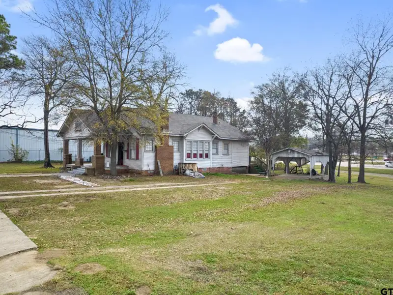Prime Commercial Property with Building and Home on Half Acre Lot