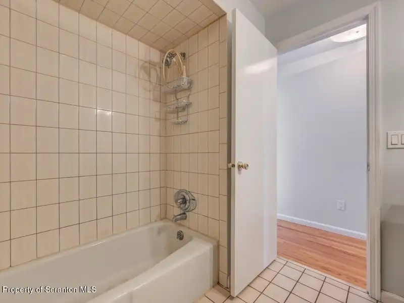 Mixed-use Property in Throop: 7-bay Garage and Updated 2-bedroom Apartment