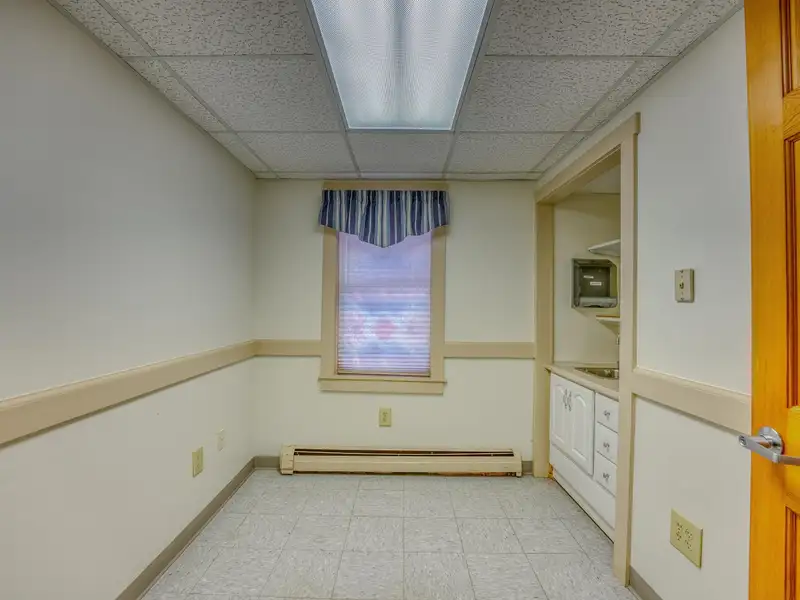 Versatile Mixed-use Property on Cottage Street, Littleton with Office Spaces and Barn