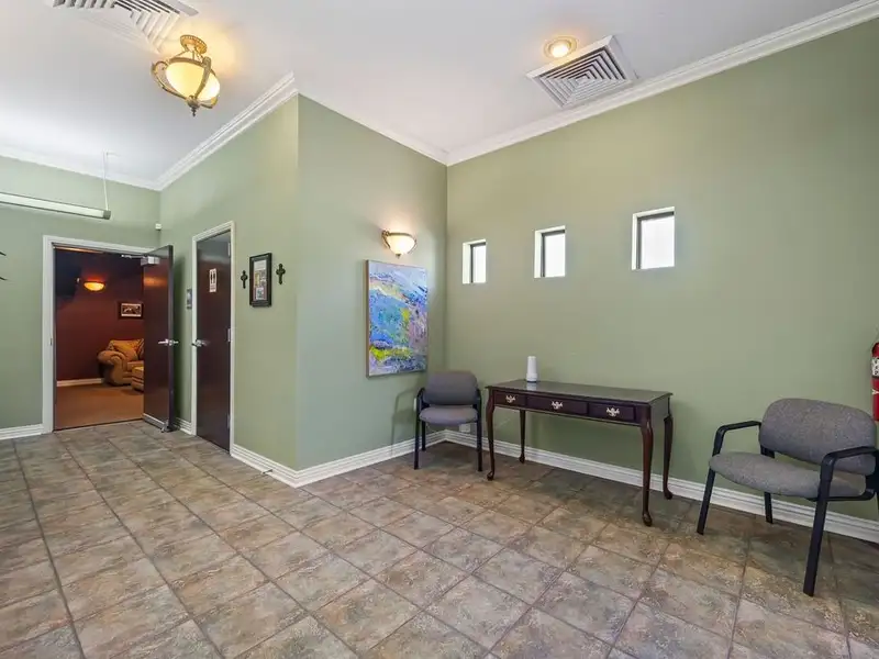 Versatile 2,752 Sq Ft Office Building in Central Rogers with Five Private Offices