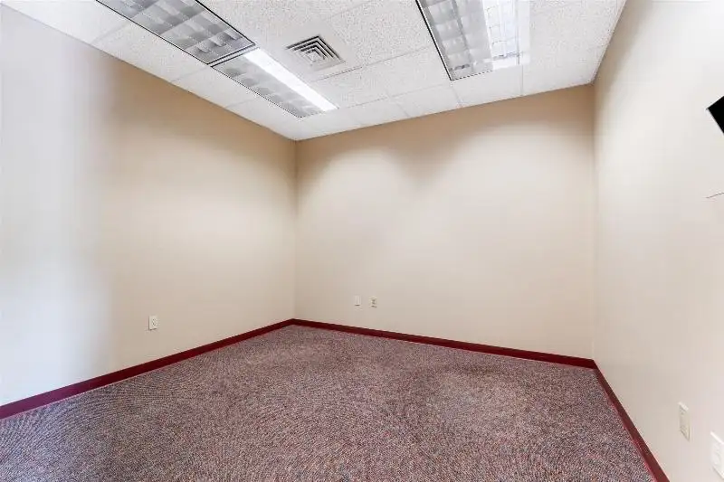 Versatile Commercial Condo for Sale Near Hwy 151 & 41 with Multiple Offices and Amenities