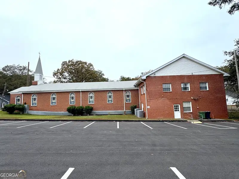 Multi-use Church Property with Sanctuary, Classrooms, Fellowship Hall, and Ample Parking