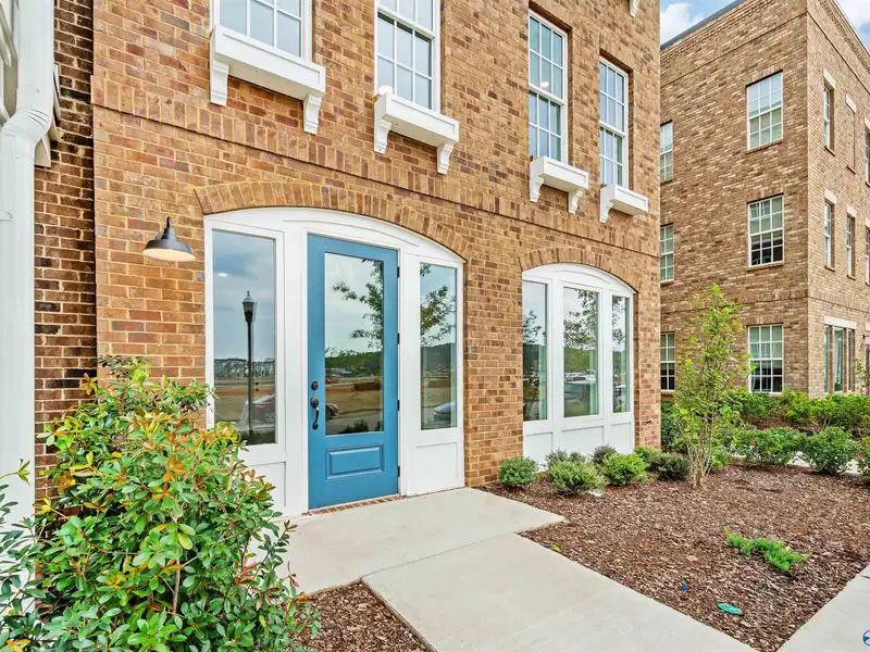 Live/work Townhome with Flex Space, Gourmet Kitchen, and 2-car Garage in Prime Location