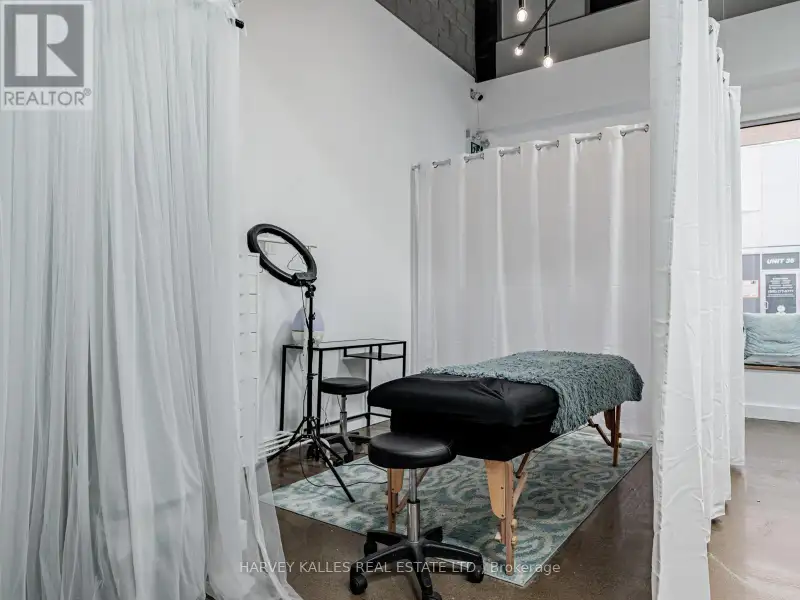 Fully Leased Commercial Condo in Prime Location on the Queensway