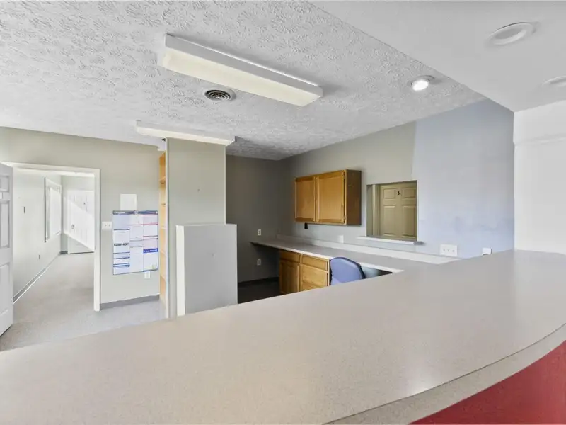 Versatile 4,305 Sq Ft Office Building with Apartment on Highway 11e