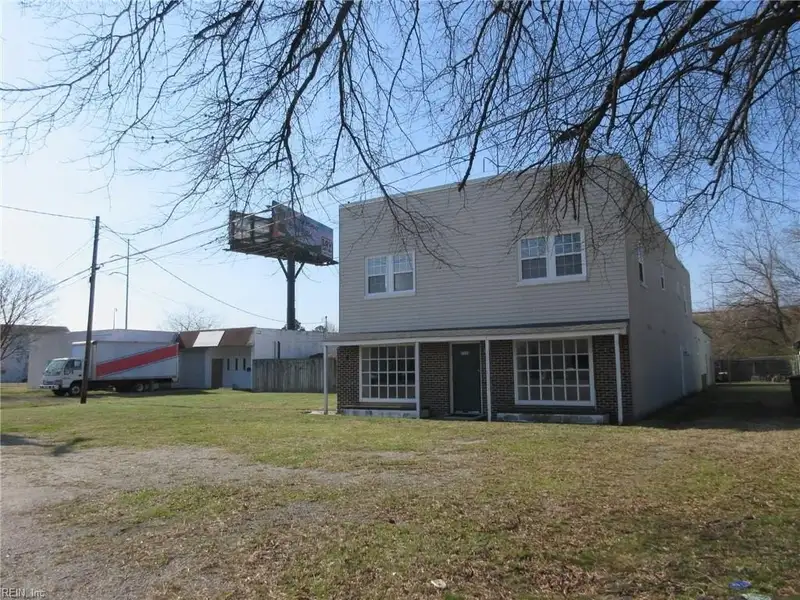 2-story Commercial Building with Office, Warehouse, and Apartments in W Pembroke