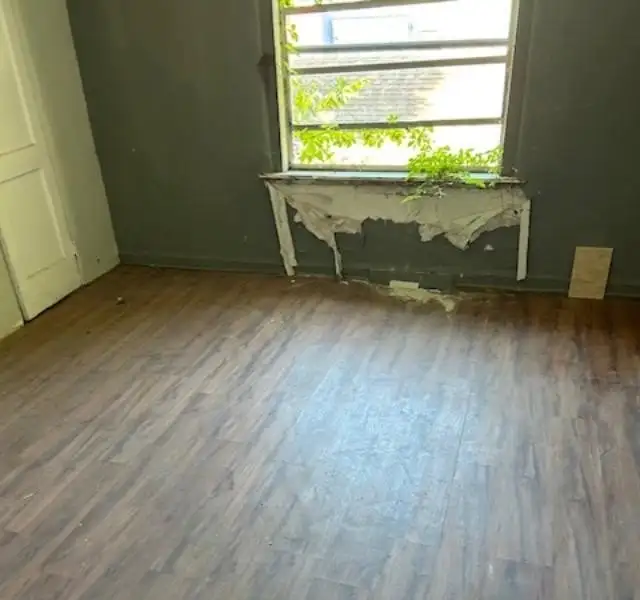 Multi-parcel Offering: Two-story Building with Renovation Potential in Prime Location