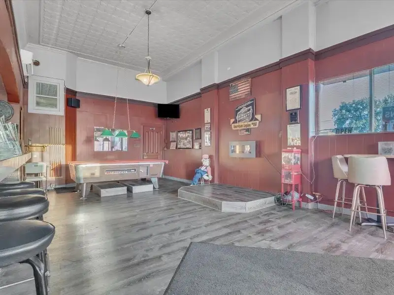 Versatile Corner Commercial Property with Retail Space and Two Apartments in Prime Location