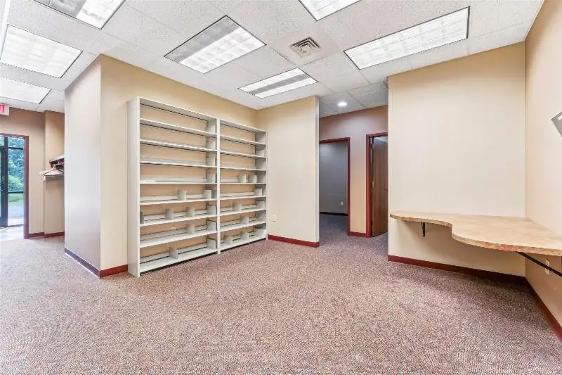 Versatile Commercial Condo for Sale Near Hwy 151 & 41 with Multiple Offices and Amenities